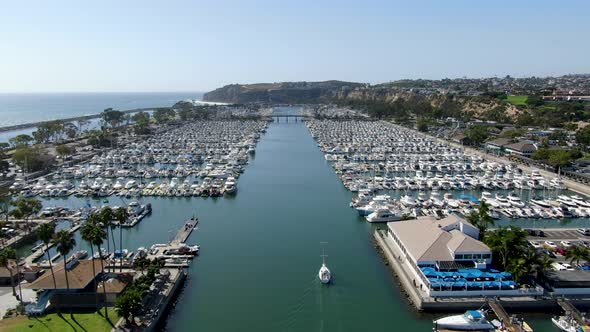 Aerial View of Dana Point Harbor and Her Marina with Yacht and Sailboat alt