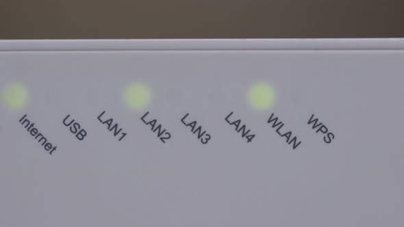 Modern Internet ADSL broadband router lights blinking rapidly 4K 2160p 30fps UltraHD footage - Conne alt