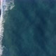 Bird View of Ocean Waves Crashing Into Sandy Beach - VideoHive Item for Sale