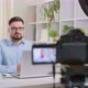 A male blogger is recording a video on a camera. Vlog concept. - VideoHive Item for Sale