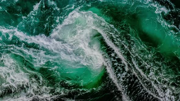 Waves of Water of the River and the Sea Meet Each Other During High Tide and Low Tide alt