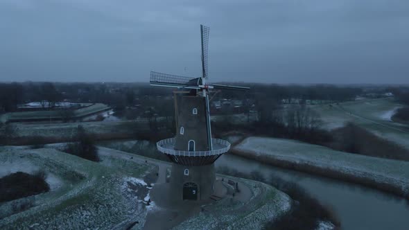 Aerial View Of Nooit Volmaakt Flour Mill On The Bank Of Linge River In Wintertime At Gorinchem, Neth alt