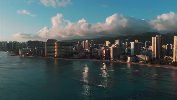 Aerial drone footage of Honolulu, Hawaii. Beautiful real estate, buildings in the city. Palm trees alt