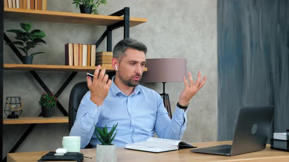 Male remote teacher online tutor communicates with students video chat conference call webcam laptop alt