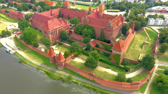 Castle fortifications of the Teutonic Order in Malbork from East. Malbork Castle is the largest cast alt