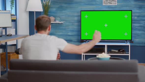 Sports Fan Watching Game On Green Screen Tv Mockup Encouraging 