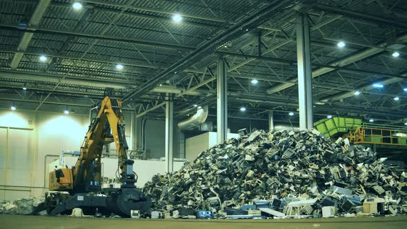 Garbage, Waste, Trash Recycling Center. Fractions of Rubbish Are Getting Displaced By the Dredger alt