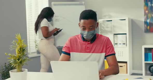 A Busy Woman Stands at the Blackboard Holding a Tablet Searches for the Right Graphic Prepares a alt