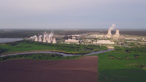 Nuclear Power Plant. Sources of electricity with low carbon footprint and Industrial emissions alt