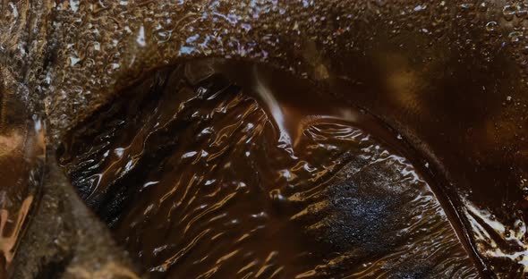 Old film strip burn with bubble.plastic burning bubbles fire closeup 35mm old film