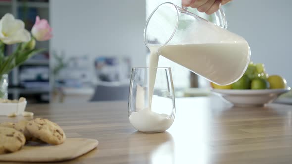 Pouring Milk In To Glass