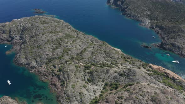 Aerial Shot of Spanish Rocky Capes with Blue Bays alt