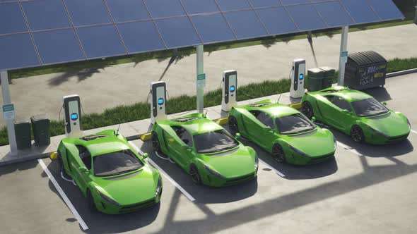 Electric cars connected to the charging station. Vehicles using renewable energy alt