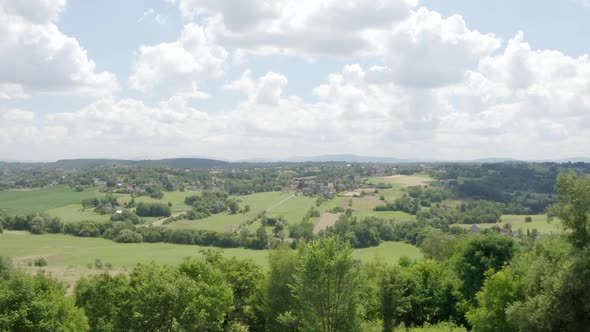 A modern European village in the foothills located on the slopes of the hills alt