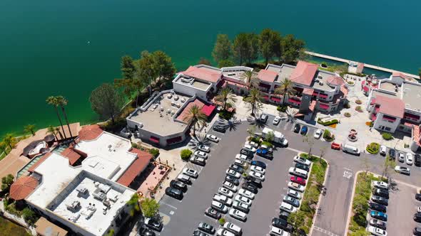 Aerial drone rotation over businesses on community lake mission viejo alt