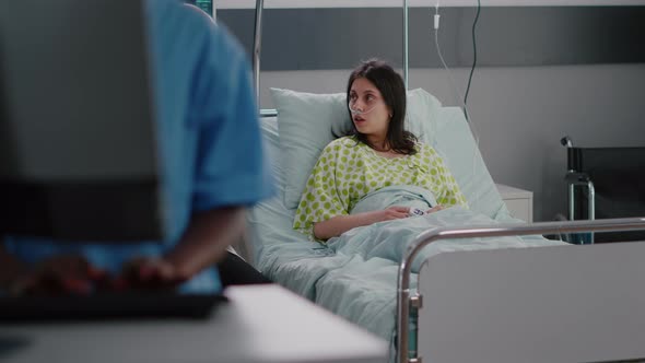 Physician Medic Examining Sick Woman Patient During Pharmaceutical Appointment alt