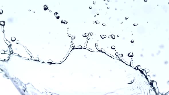 Super Slow Motion Shot of Water Splash at 1000Fps on White Background alt