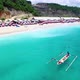 Aerial View over a Local Wooden Boat near Pantai Pandawa Beach, Nusa Dua, Bali, Indonesia. - VideoHive Item for Sale