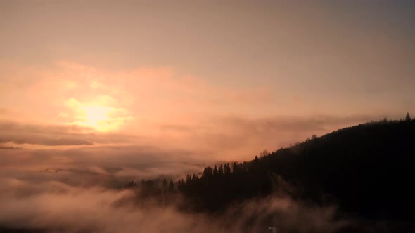 Foggy Sunrise in Mountains alt