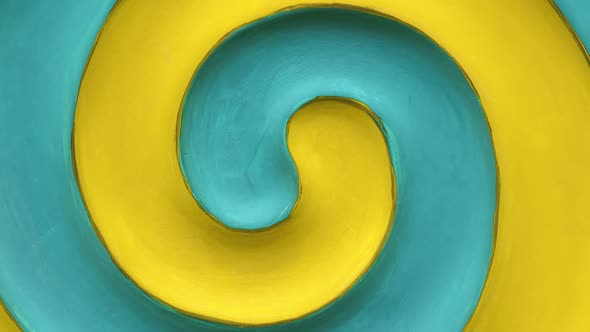 Yellow and teal blue spiral rotation alt