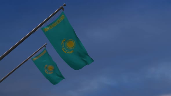 Kazakhstan  Flags In The Blue Sky - 4K