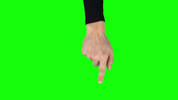 Man Hand in Black Sweater Is Performing Swipe Up at Tablet Screen Gesture on Green Screen. Close Up alt
