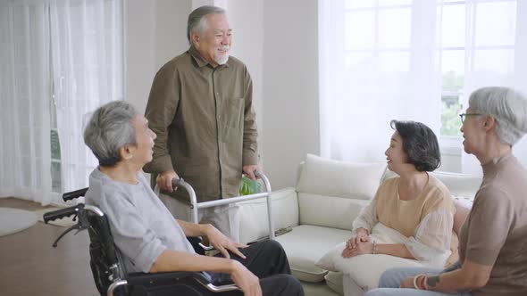 Group Asian seniors friends with are enjoying talking together.