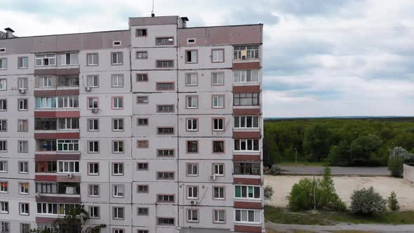 Industrial Alpinism. Aerial View. Work on Outer Insulate Building with Styrofoam alt