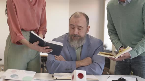 Exhausted Elderly Man Having Difficulties at Work alt