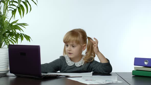 Preschool Child Girl Distance Online Learning at Home. Kid Studying Using Digital Laptop Computer alt