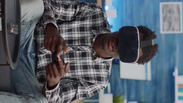 Vertical Video Black Couple Playing Virtual Game with Vr Glasses at Home alt
