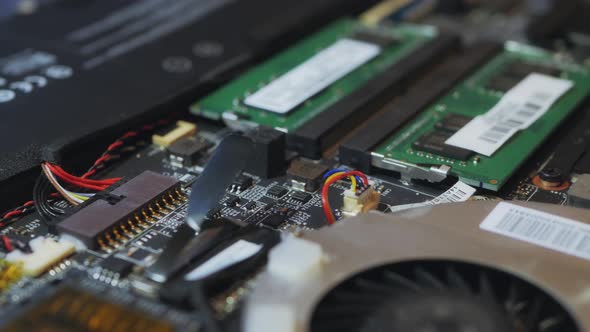 Inside Laptop Motherboard Repair alt