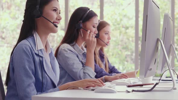 Customer Support Agent or Call Center with Headset Talking to Customer on Phone alt