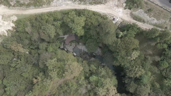 Aerial view of Martvili canyon. Blue water in fresh cold mountain river at sunny summer morning alt