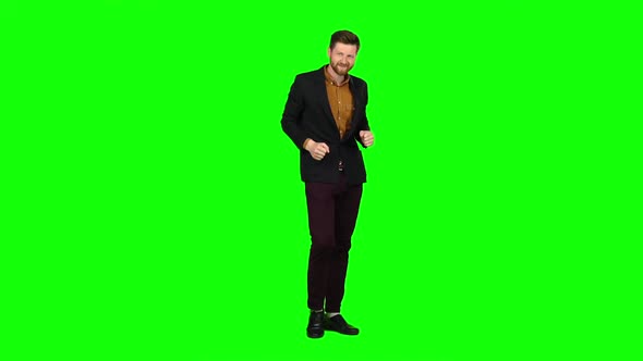 Man Dances, Flirts, Winks, and There Are Eyes. Green Screen alt