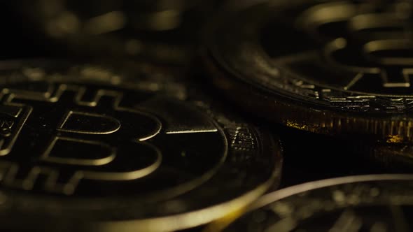 Rotating shot of Bitcoins (digital cryptocurrency) - BITCOIN 0570 alt