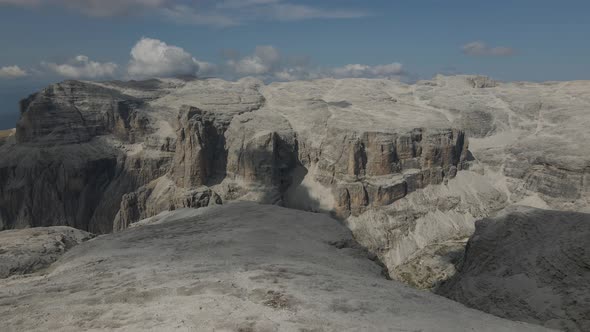 Dolomites aerial view, top of a tall mountain awesome secluded landscape, Italy alt