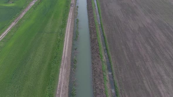 Top-level Irrigation Canal in the Rice System. Canal for Irrigation of Fields. alt