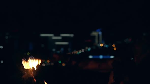 Young Blond Male Breathes Out Large Stream of Fire Twice Making Fireballs alt