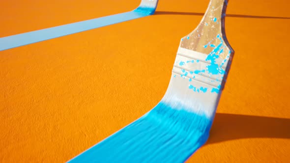 Wooden paintbrush leaving stripe of colorful cyan paint on an orange wall. 4KHD alt