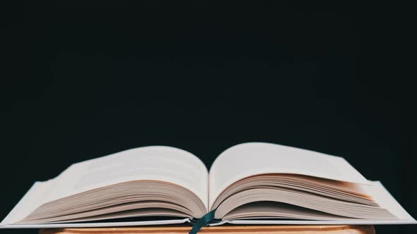 The Pages of the White Book Flip Over Randomly Under the Influence of the Winds alt