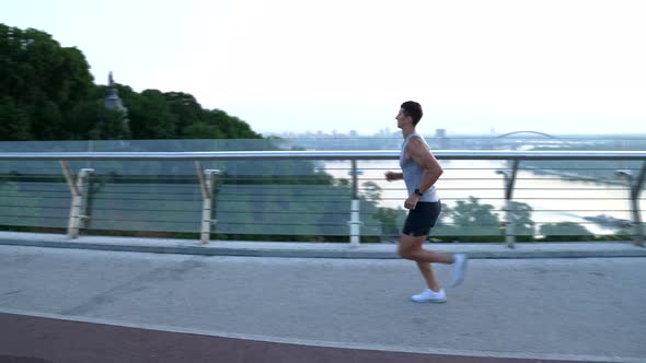 Muscular Man Athlete with Fit Body Run in Sporty Wear Sport