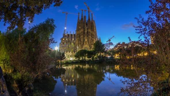 Sagrada Familia, a Large Church in Barcelona, Spain Day To Night Timelapse. alt
