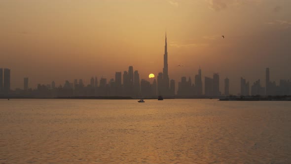 Dubai City Skyline During Sunset alt