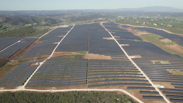 Aerial high panoramic view energy solar farm, countryside landscape. Portugal