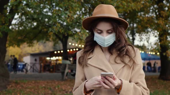 Woman Uses Phone alt