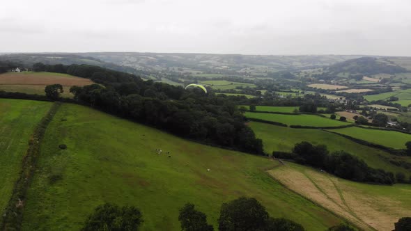 Paragliding shot with a view of the English Countryside alt