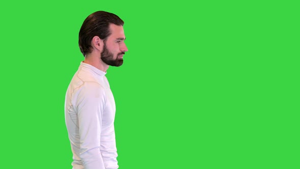 Walking Handsome Guy in Motion on a Green Screen Chroma Key alt