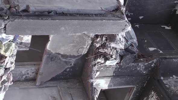 Vertical Video of the Consequences of the War in Ukraine  a Destroyed Building alt