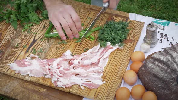 Man Fries Bacon Autumn River alt